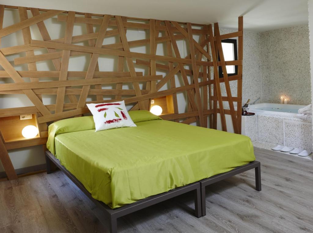 Posteľ alebo postele v izbe v ubytovaní Hotel Galería Essentia