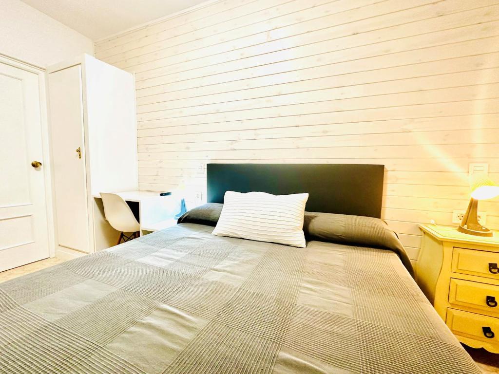 Postel nebo postele na pokoji v ubytování Hostal La Taberna