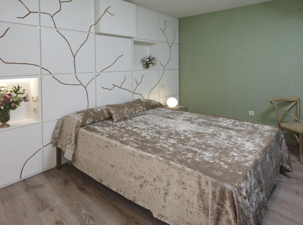 Posteľ alebo postele v izbe v ubytovaní Hotel Galería Essentia