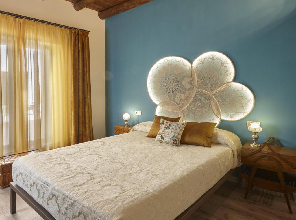 Posteľ alebo postele v izbe v ubytovaní Hotel Galería Essentia