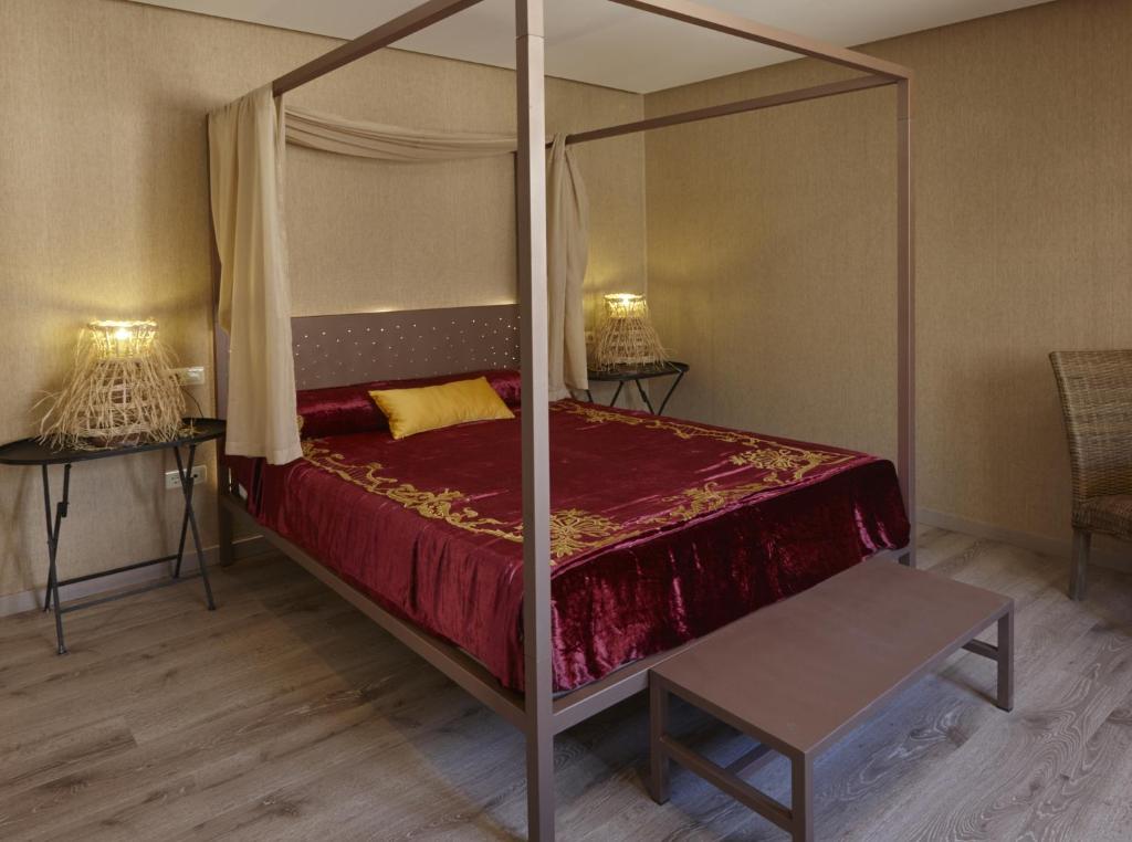 Posteľ alebo postele v izbe v ubytovaní Hotel Galería Essentia