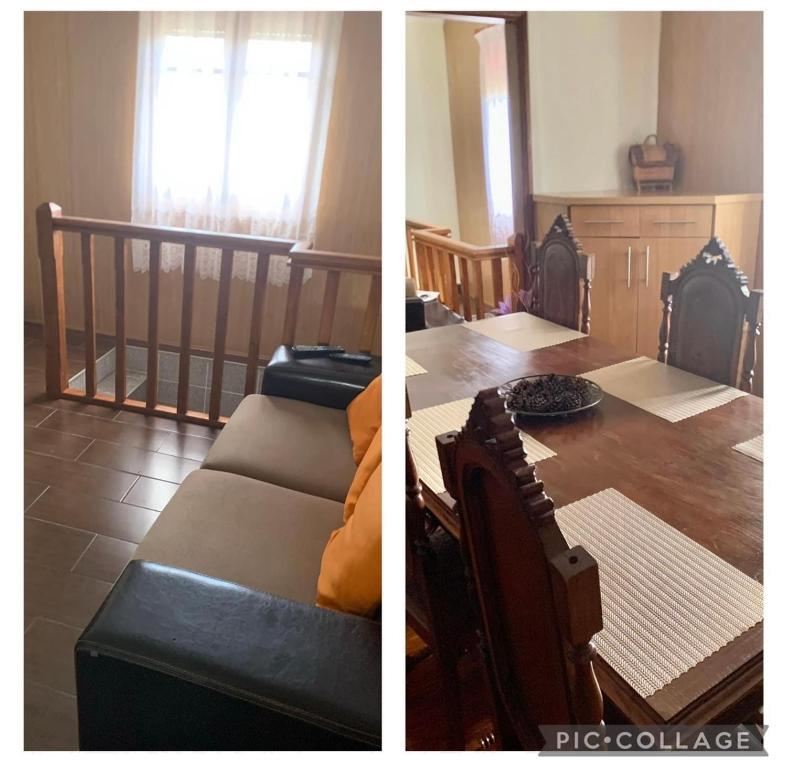 salon z kanapą i stołem jadalnym w obiekcie Pomares Country House w mieście Melgaço