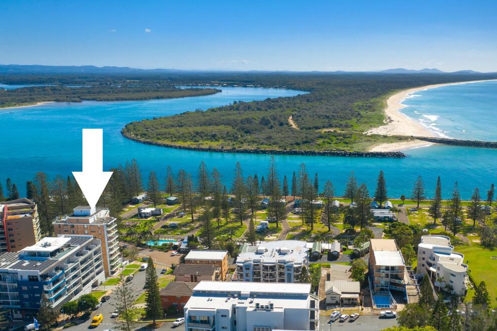 an aerial view of a resort next to a beach at Tasman Towers 5 3 Munster Street in Port Macquarie