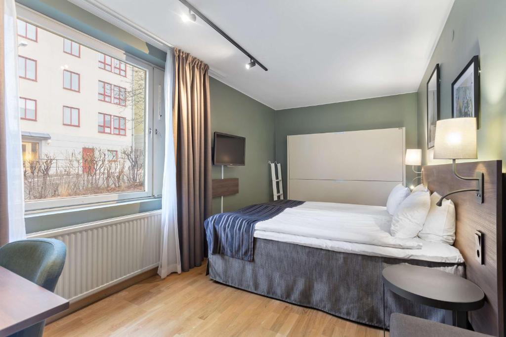 Postel nebo postele na pokoji v ubytování Best Western Plus Skogshöjd