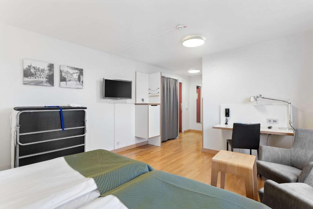TV a/nebo společenská místnost v ubytování Best Western Plus Skogshöjd