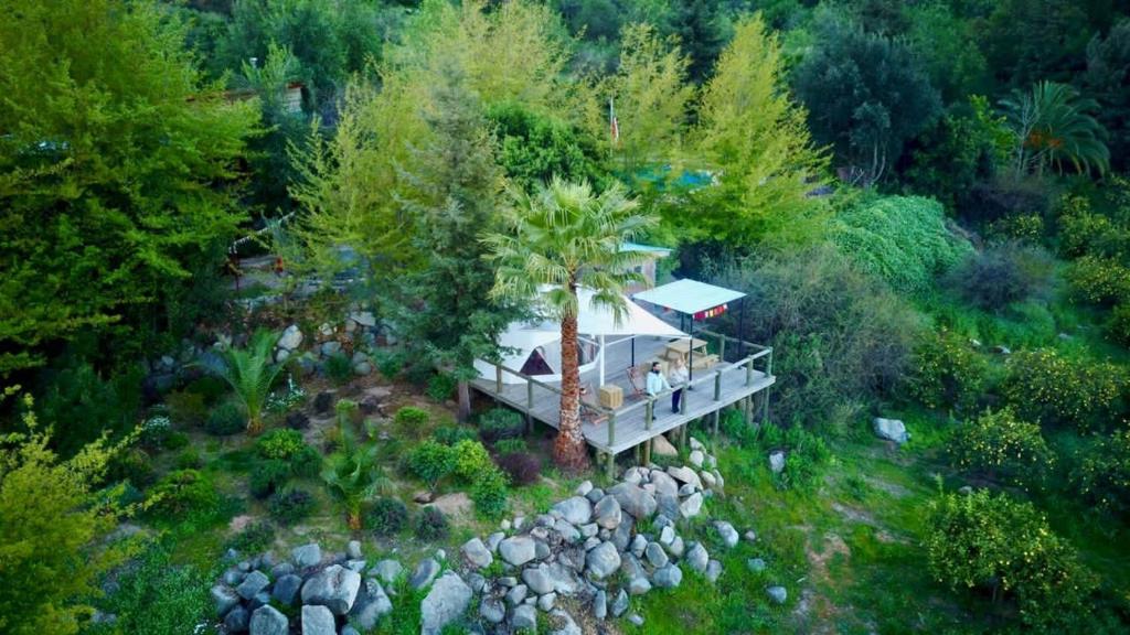 an aerial view of a house in the trees at Colchagua Camp in Santa Cruz