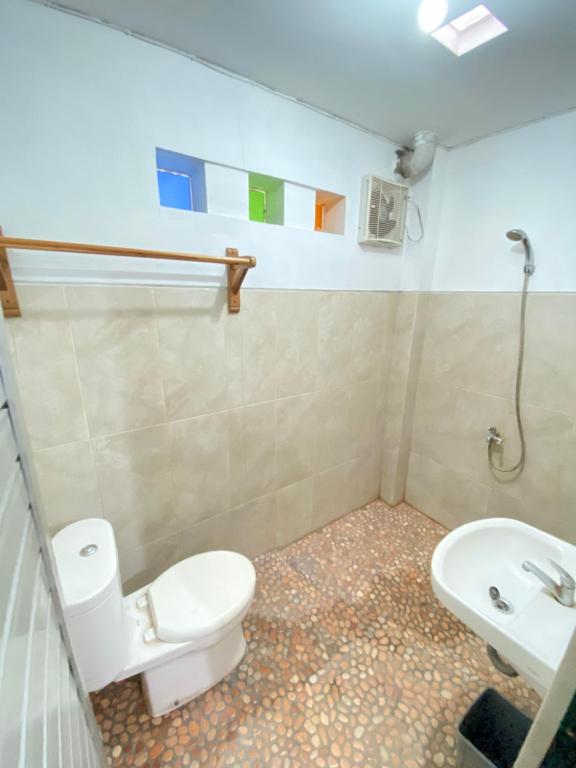 Koupelna v ubytování Sonosewu Guesthouse Syariah