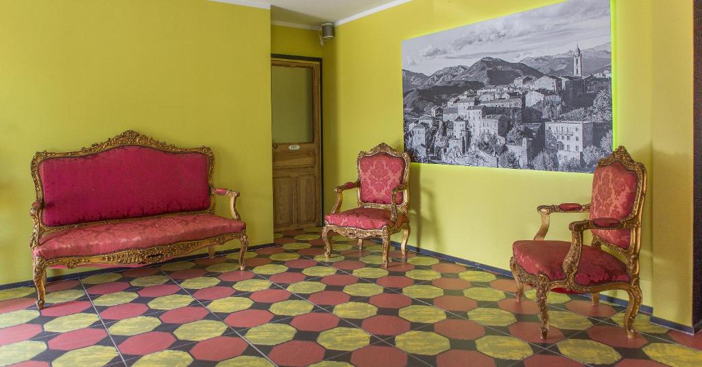 Posezení v ubytování Rossi Hôtel
