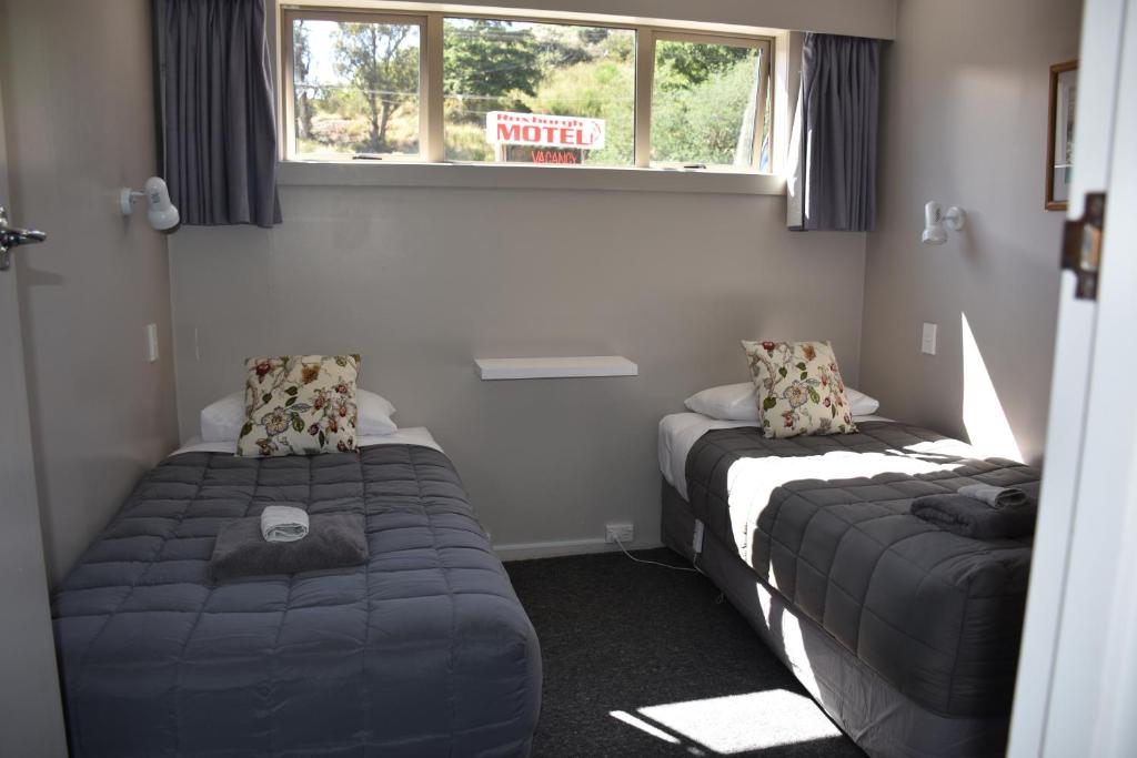 Postel nebo postele na pokoji v ubytování Roxburgh Motels