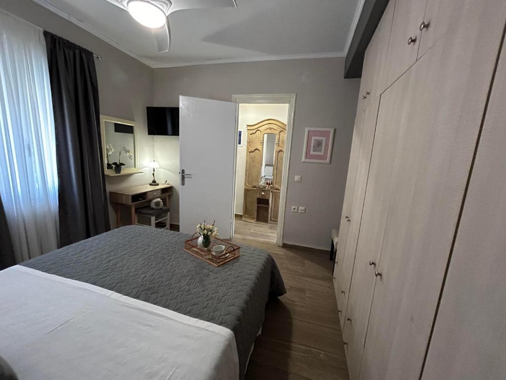 Postel nebo postele na pokoji v ubytování Karydakis Properties