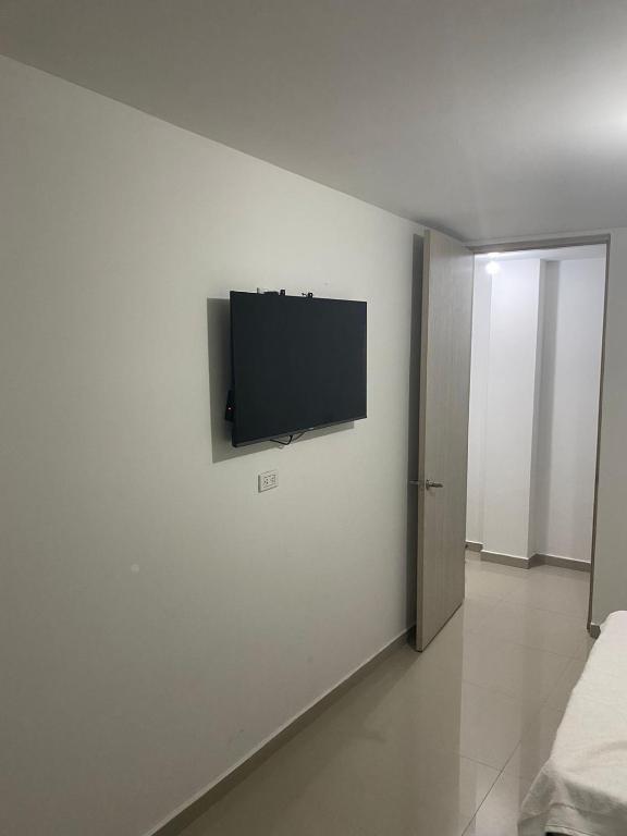 TV a/nebo společenská místnost v ubytování HOTEL IBIZA