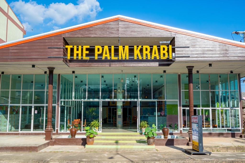 a building with a sign that reads the painelin krab at The Palm Krabi Residence And Resort in Ban Khlong Chi Lat