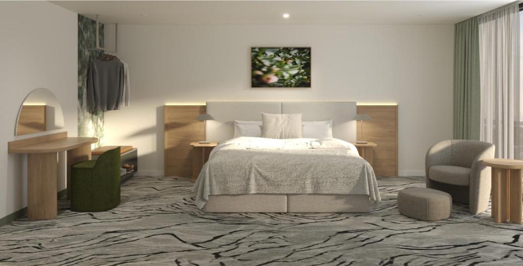 1 dormitorio con 1 cama y 1 silla en Veriu Macquarie Park, en Sídney