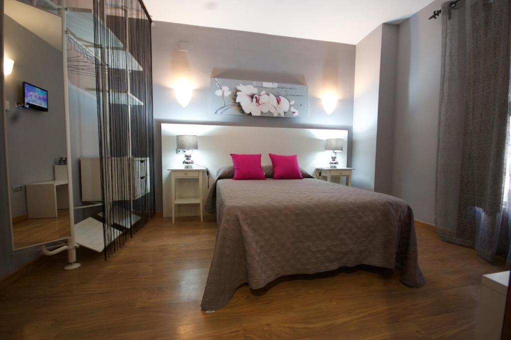 Postel nebo postele na pokoji v ubytování Hotel Hc Zoom