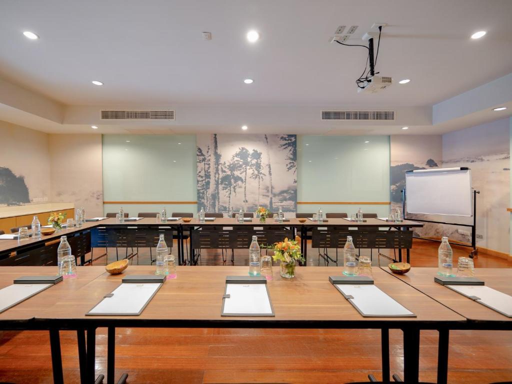 a large room with a large table in a classroom at Amari Koh Samui in Chaweng