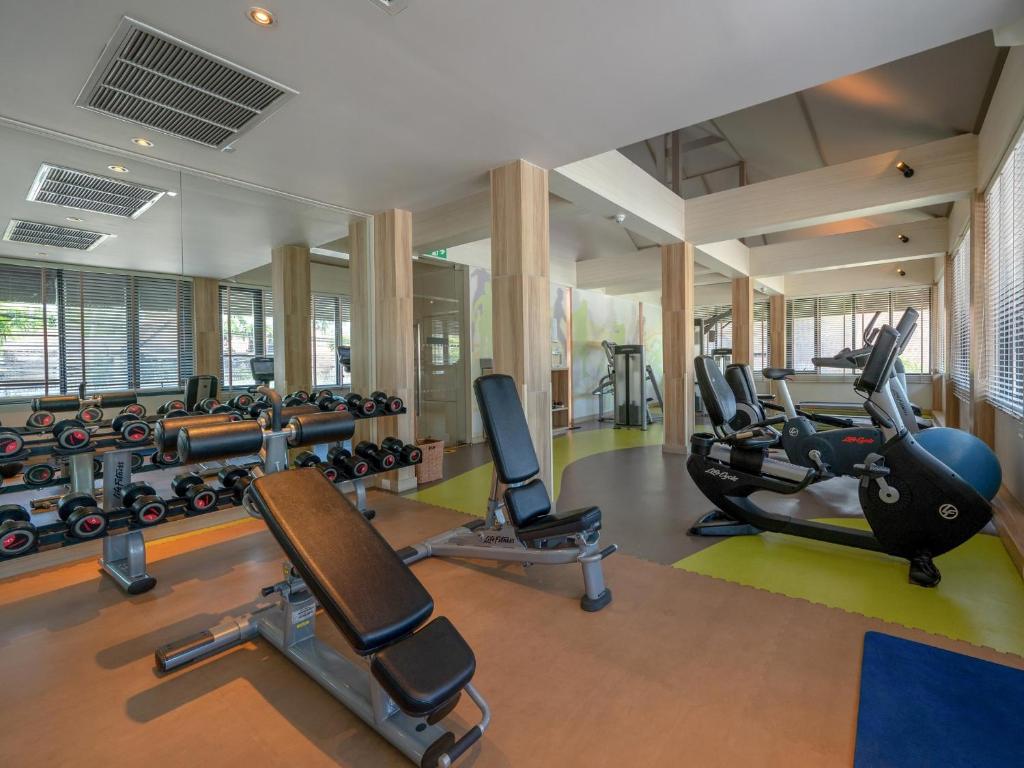 a gym with cardio equipment and treadmills at Amari Koh Samui in Chaweng