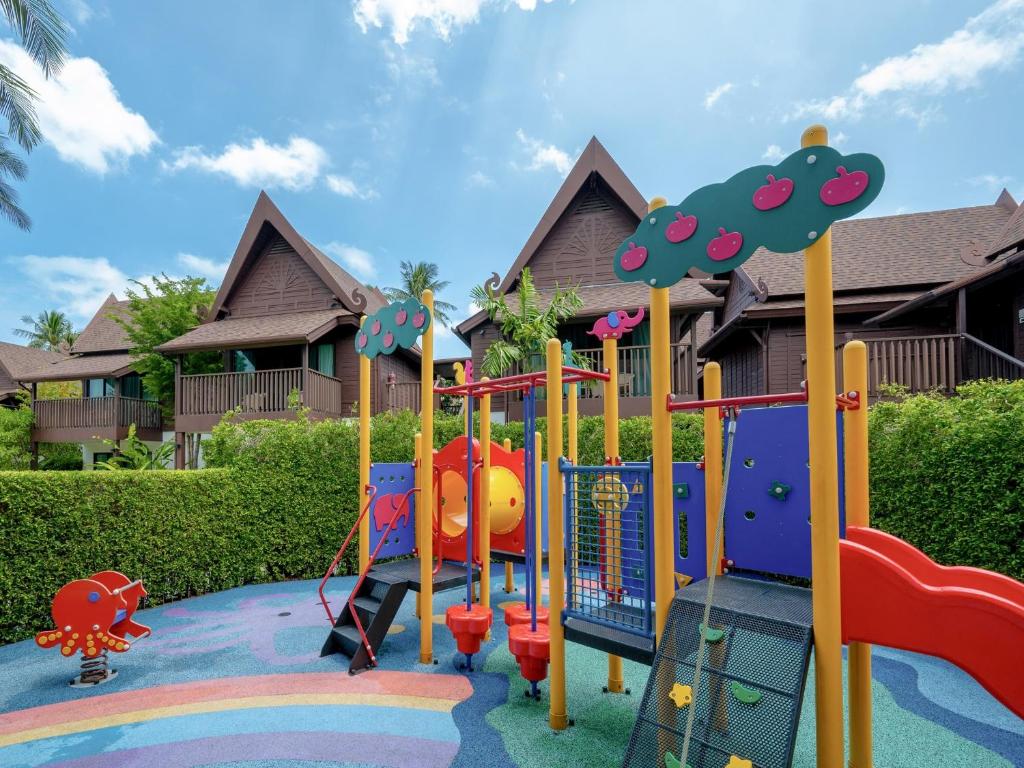 a playground in front of a house at Amari Koh Samui in Chaweng