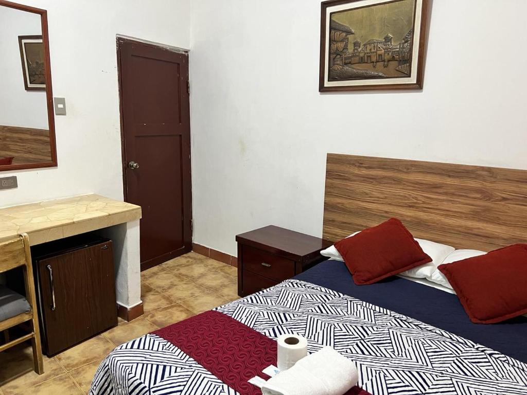 Postel nebo postele na pokoji v ubytování Atlantic Suites Hotel