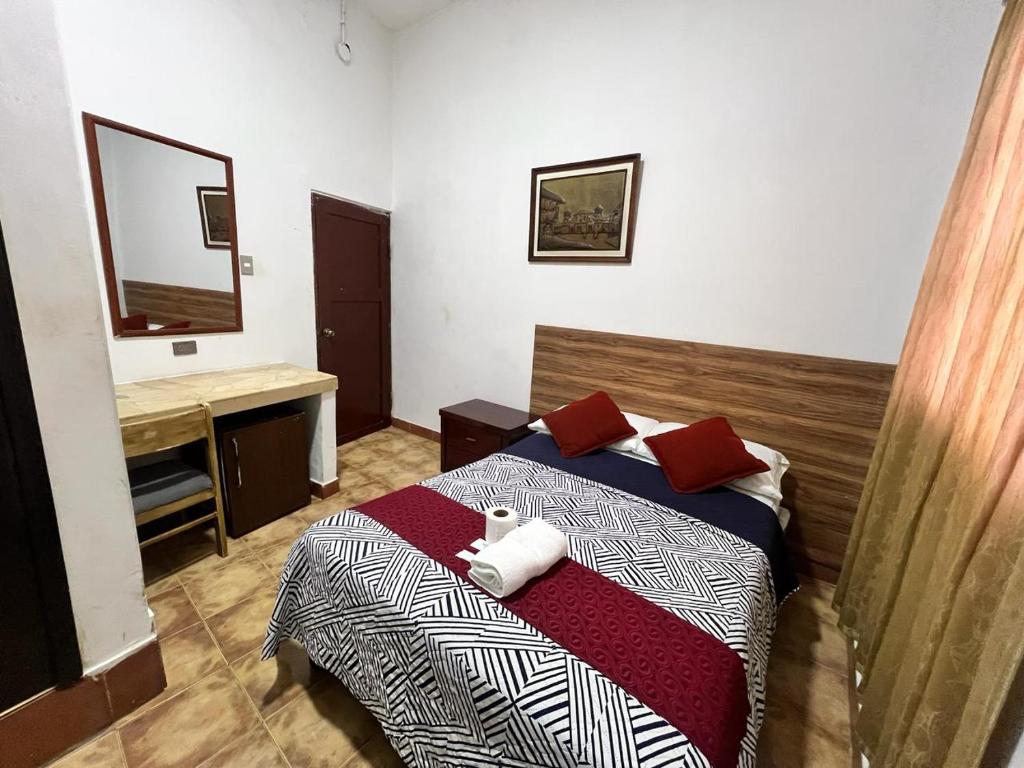 Postel nebo postele na pokoji v ubytování Atlantic Suites Hotel