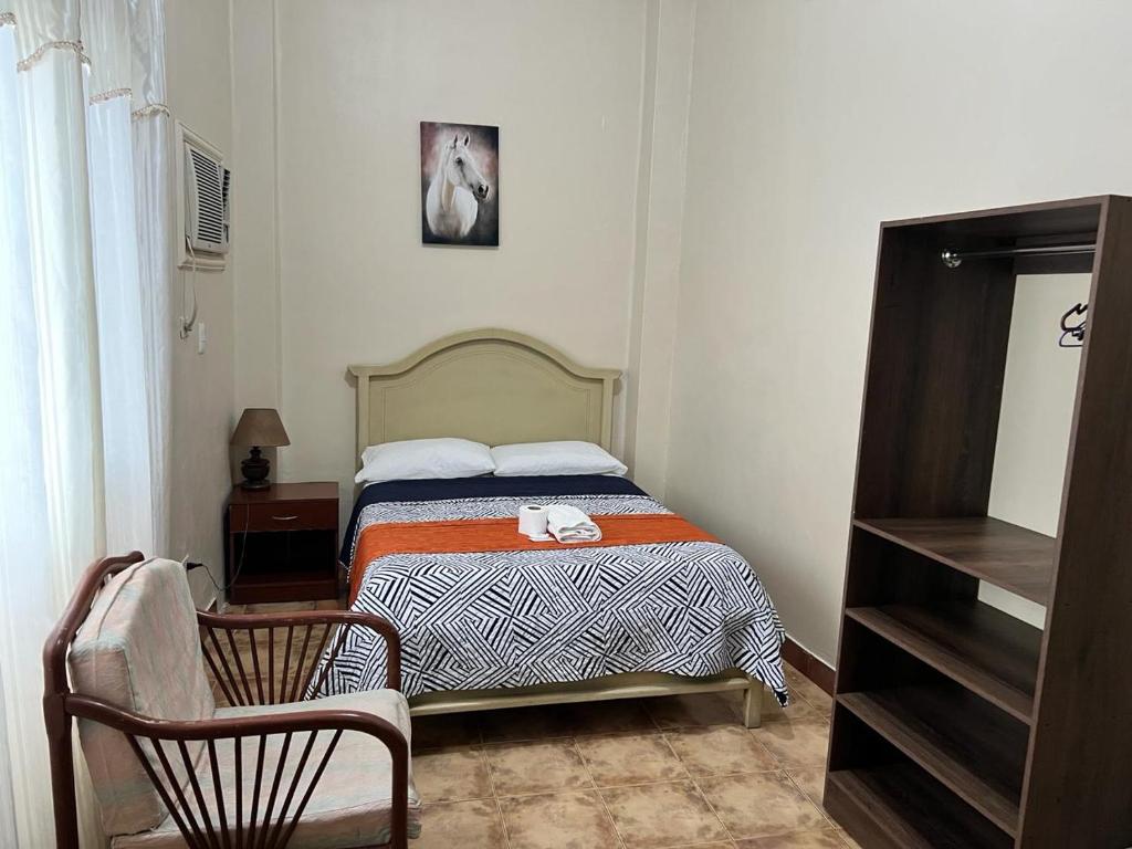 Postel nebo postele na pokoji v ubytování Atlantic Suites Hotel