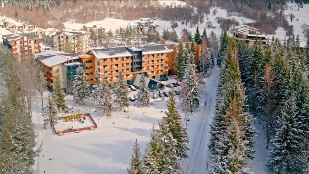 an aerial view of a resort in the snow at Bakuriani Inn A112 in Bakuriani