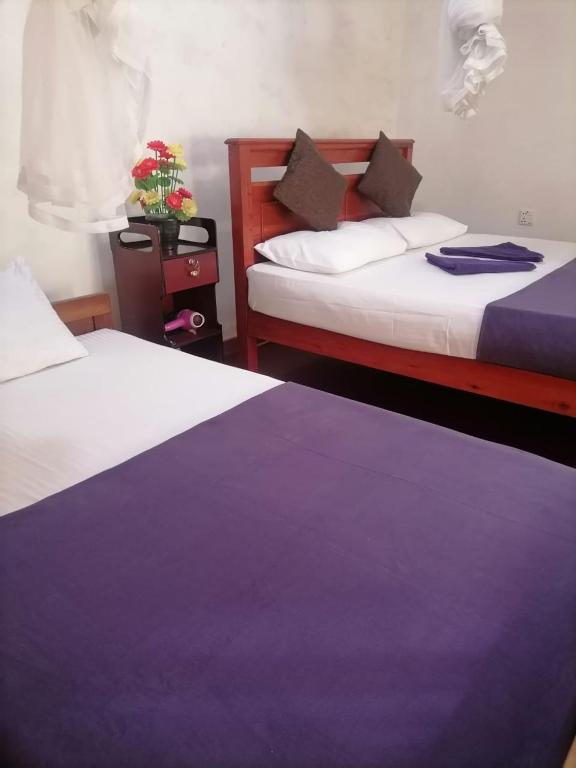 Postel nebo postele na pokoji v ubytování Opal Cottage Ella