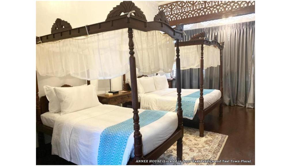 Postel nebo postele na pokoji v ubytování Paradores Del Castillo