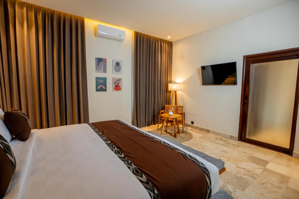 Postel nebo postele na pokoji v ubytování Oma Ubud