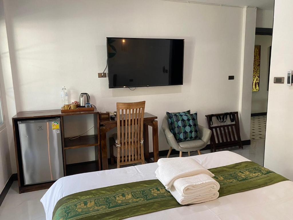 Postel nebo postele na pokoji v ubytování Lemon Guesthouse