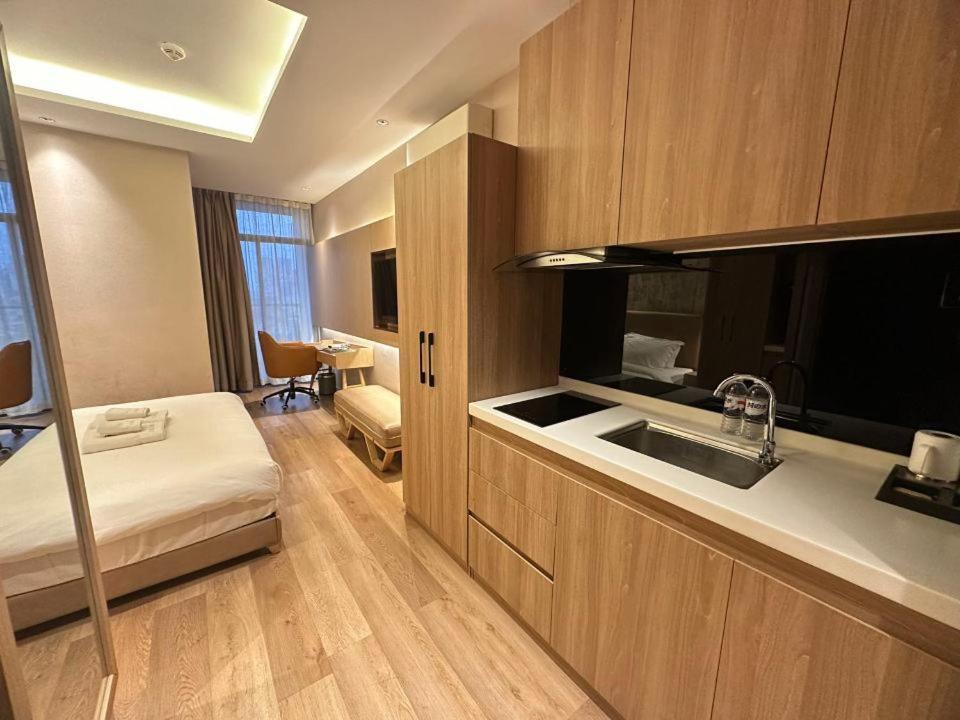 Postel nebo postele na pokoji v ubytování SF HOTEL Penthouse Residences