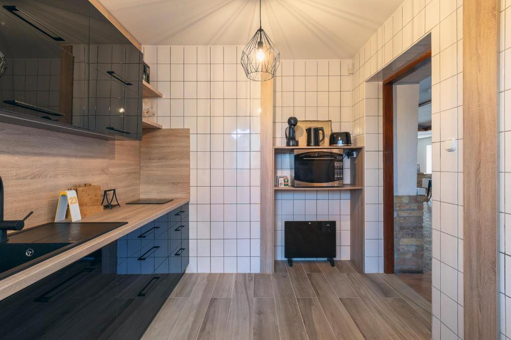 Kuchyň nebo kuchyňský kout v ubytování Feel Good House
