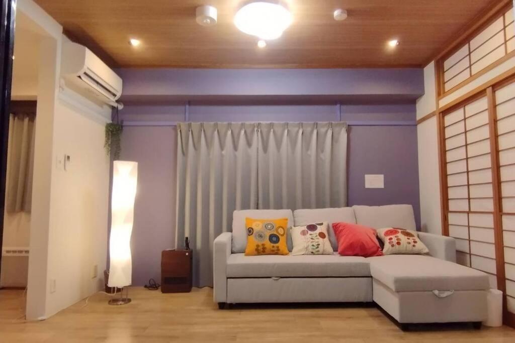 Posezení v ubytování Nagoya Apartment Oosu