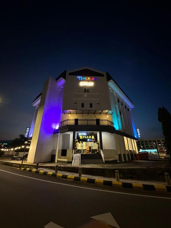 a building on the side of a street at night at Hotel Apsara Temerloh Gateway in Temerloh