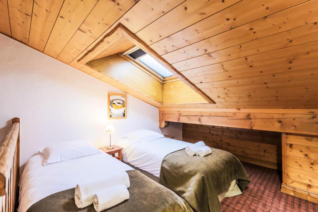 Posteľ alebo postele v izbe v ubytovaní Résidence Les Alpages de Chantel - maeva Home - Appartement 3 pièces 6 personnes Sélection MAE-8772