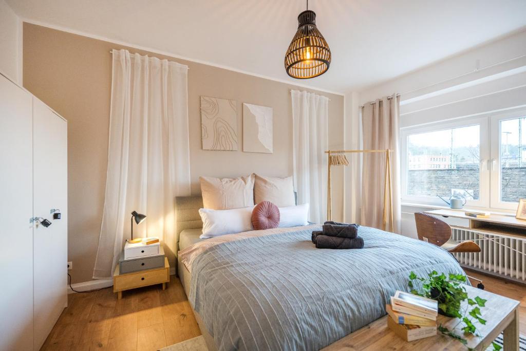 Postel nebo postele na pokoji v ubytování Koblenz' Größte, 5 SZ, HBF, ideal für Gruppen & Firmen