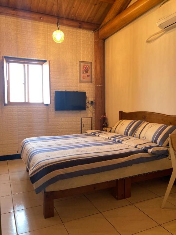 Postel nebo postele na pokoji v ubytování Machigo