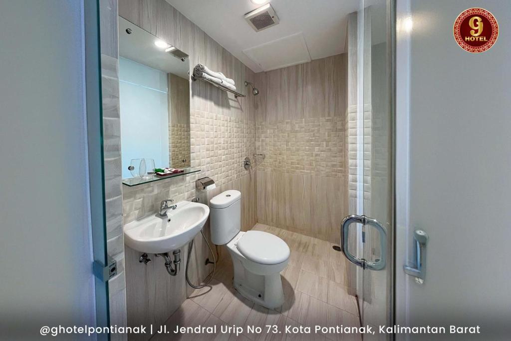 Koupelna v ubytování G-Hotel Pontianak
