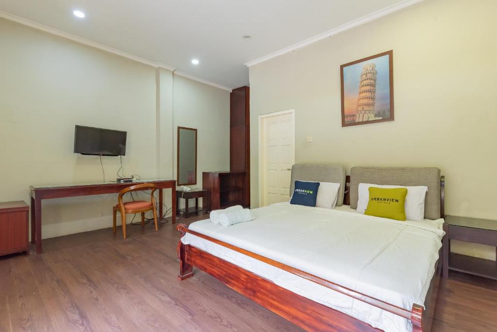 TV a/nebo společenská místnost v ubytování Urbanview Resort Botol Cisarua Puncak Bogor