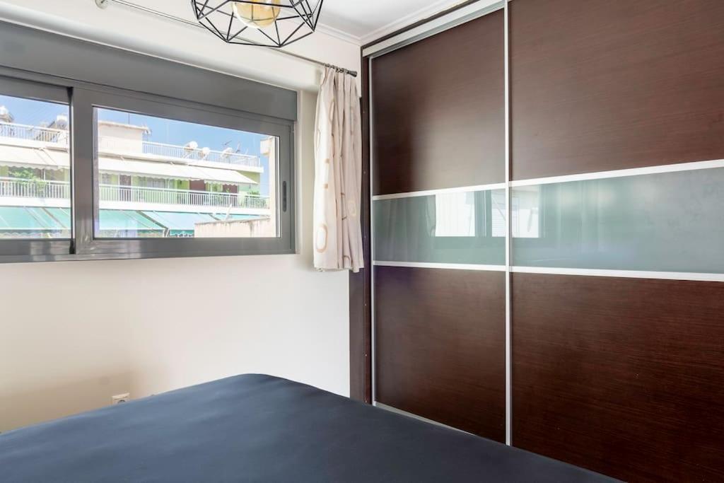 Postel nebo postele na pokoji v ubytování Comfort 1BR apt with amazing balcony at Piraeus
