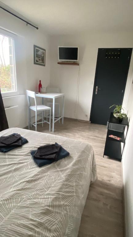 Postel nebo postele na pokoji v ubytování Chambre chez l habitant Audrey