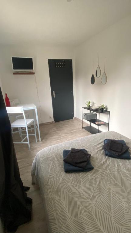 Postel nebo postele na pokoji v ubytování Chambre chez l habitant Audrey