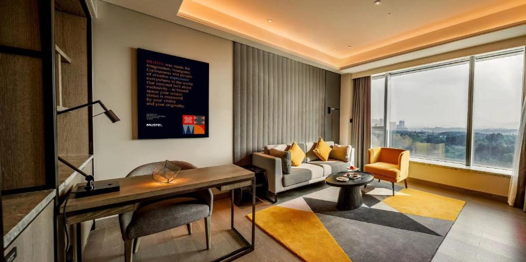 Posezení v ubytování Mustel Hotel Knowledge City Guangzhou