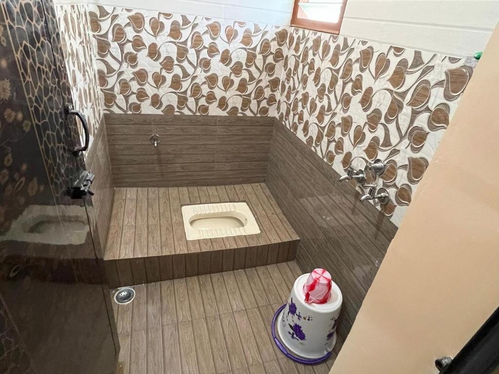 Koupelna v ubytování Sai Ayush Homestay