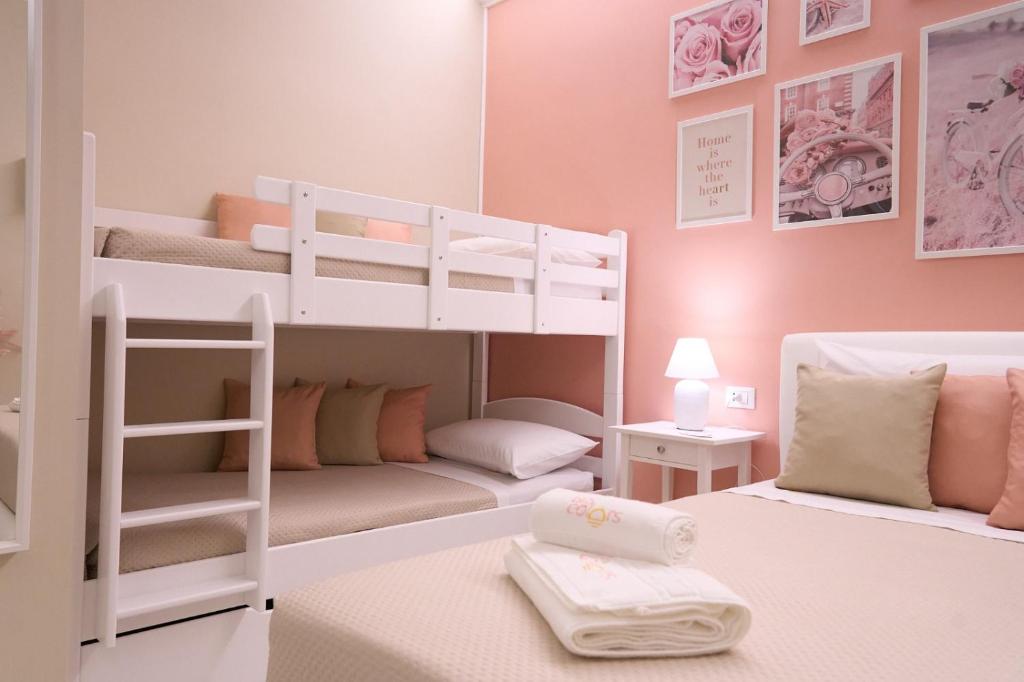 Postel nebo postele na pokoji v ubytování B&B Colors