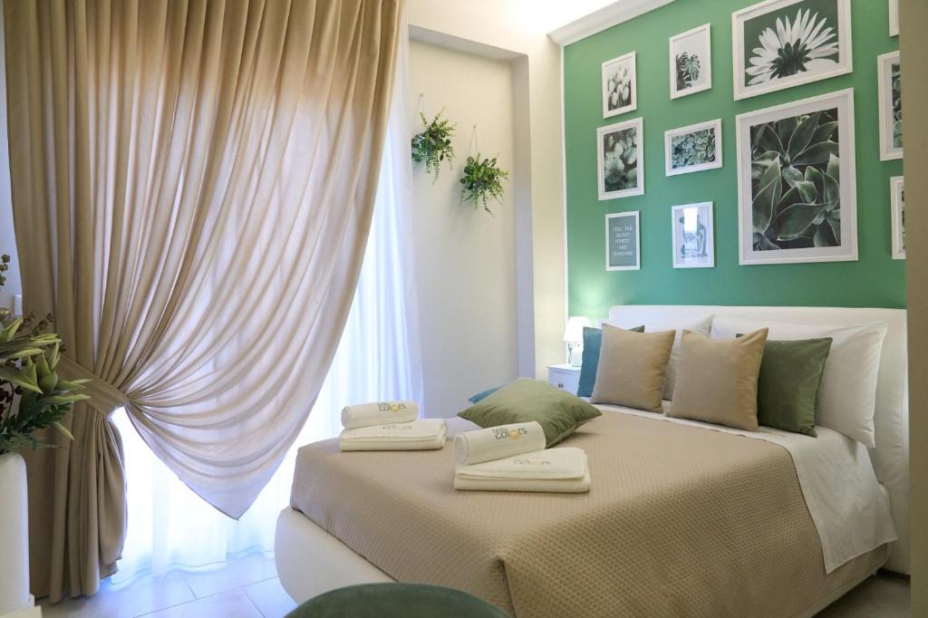 Postel nebo postele na pokoji v ubytování B&B Colors