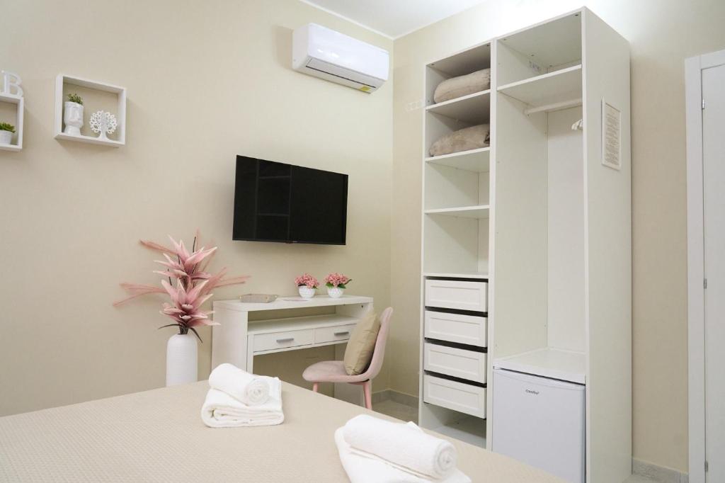 TV a/nebo společenská místnost v ubytování B&B Colors