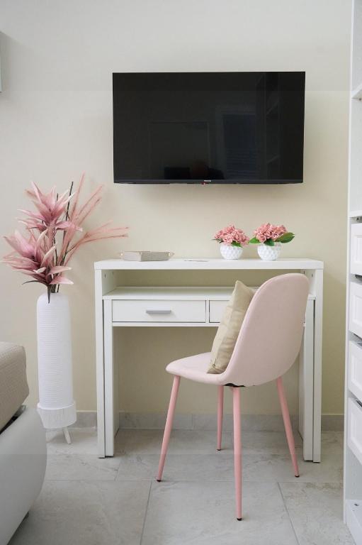 TV a/nebo společenská místnost v ubytování B&B Colors