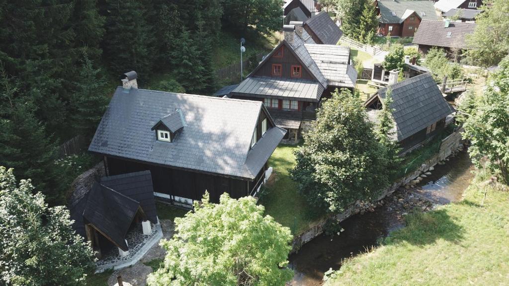 an aerial view of a house in a forest at folk cottage Vysna Boca in Vyšná Boca