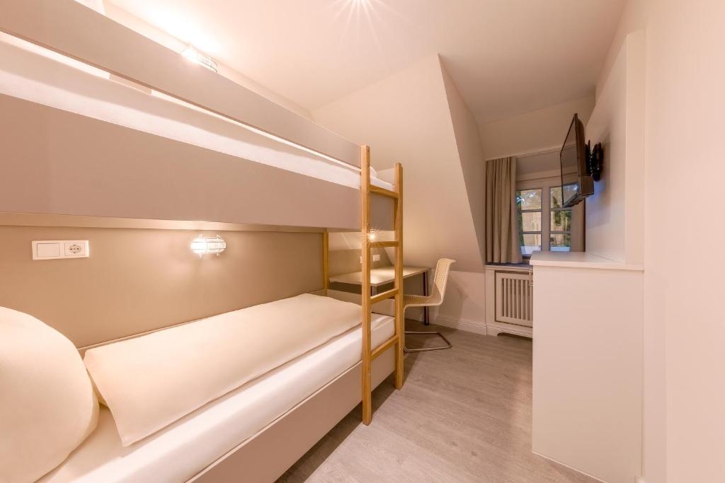 Postel nebo postele na pokoji v ubytování Michels Ferienhaus Amalie