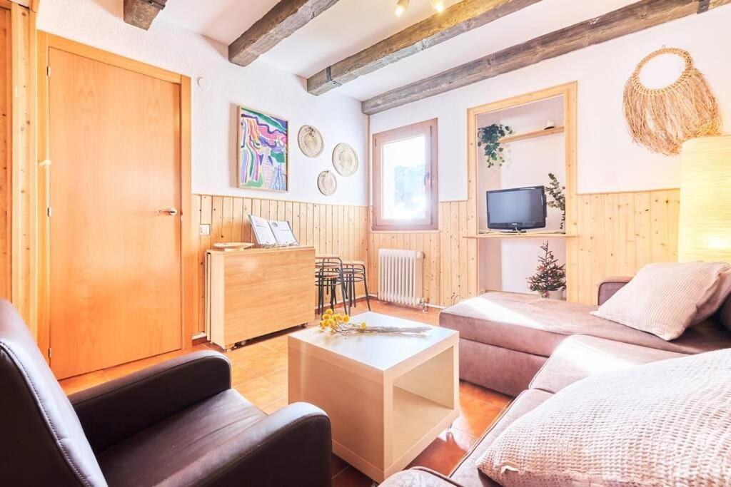 TV a/nebo společenská místnost v ubytování Rincón de Anayet Entrada Autónoma Formigal